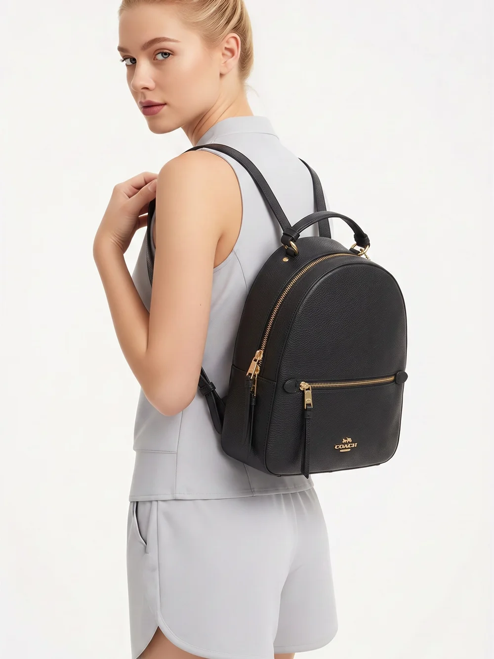 Coach Black Staffiano Leather Mini Backpack with Gold Hardware Accents